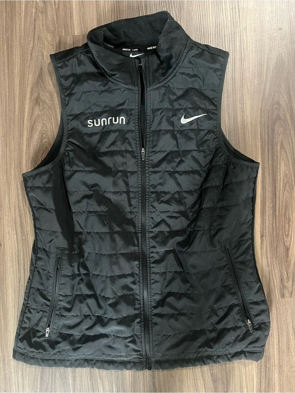 Nike Women's Black Quilted Vest with Sunrun and Swoosh Logos